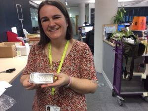 Michelle Crowther holding Sarah Grand's cigarette case